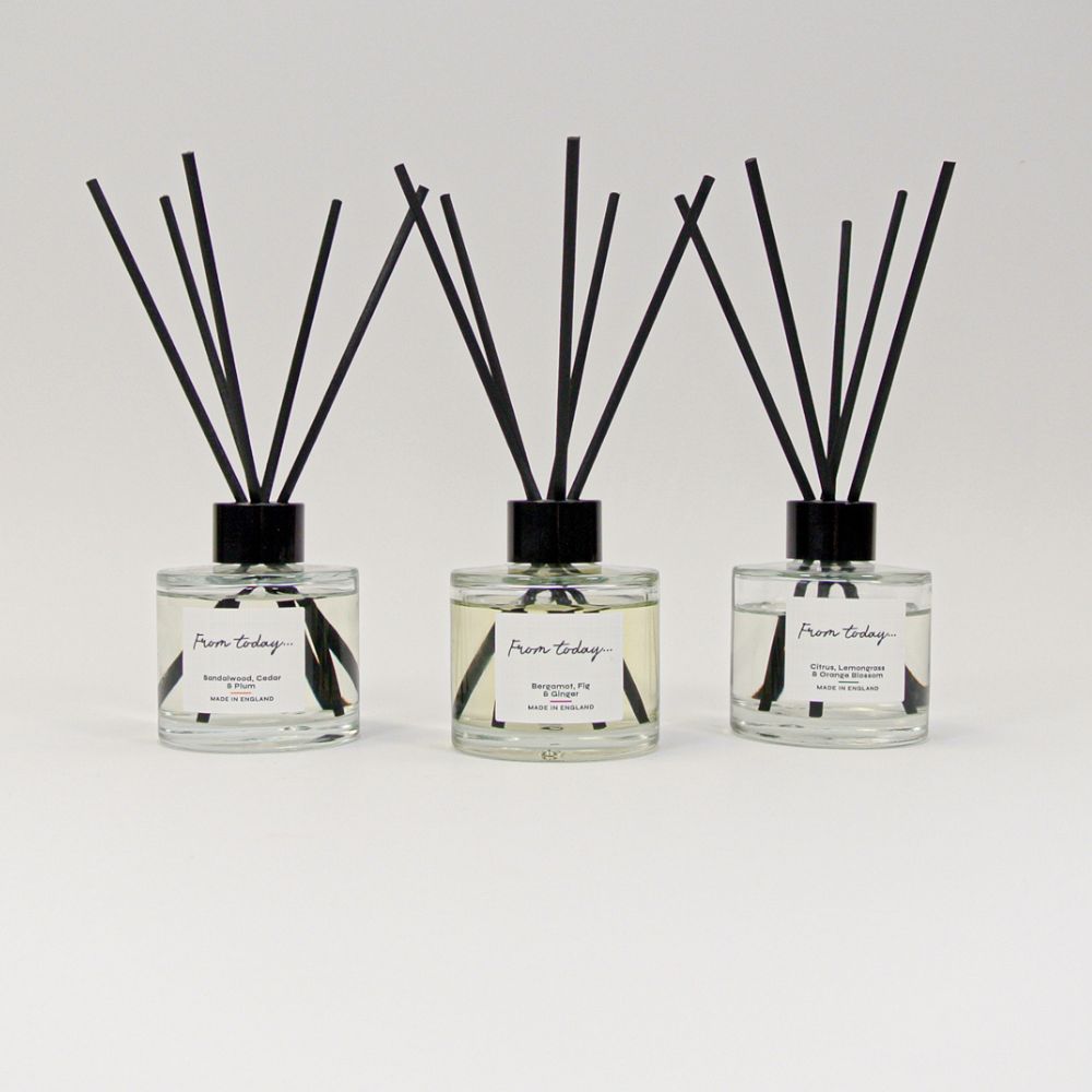 trio of luxury reed diffusers in Bergamot, Fig & Ginger, Sandalwood, Cedar & Plum and Citrus, Lemongrass & Orange Blossom