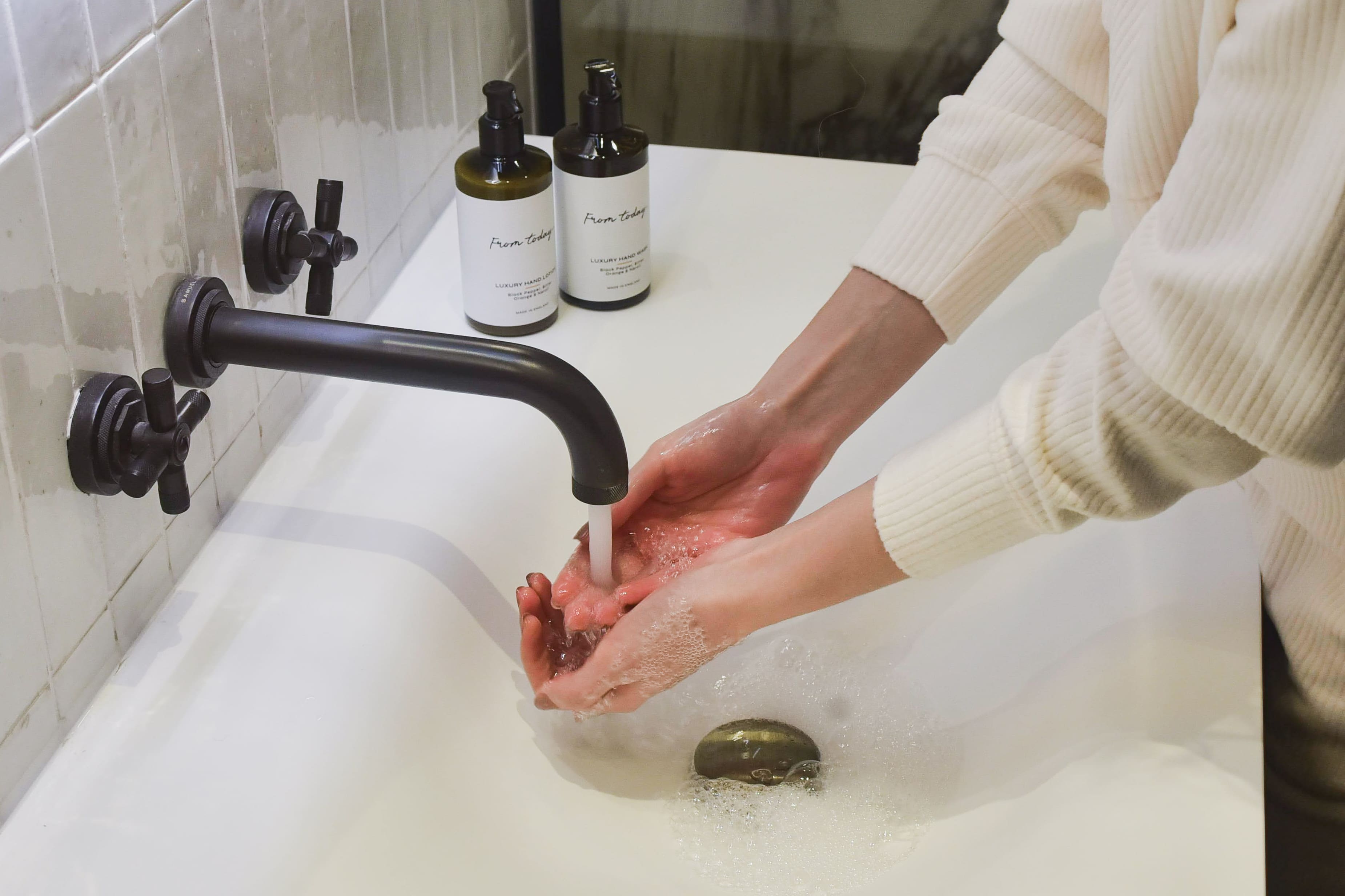 woman washing hands with From today hand wash