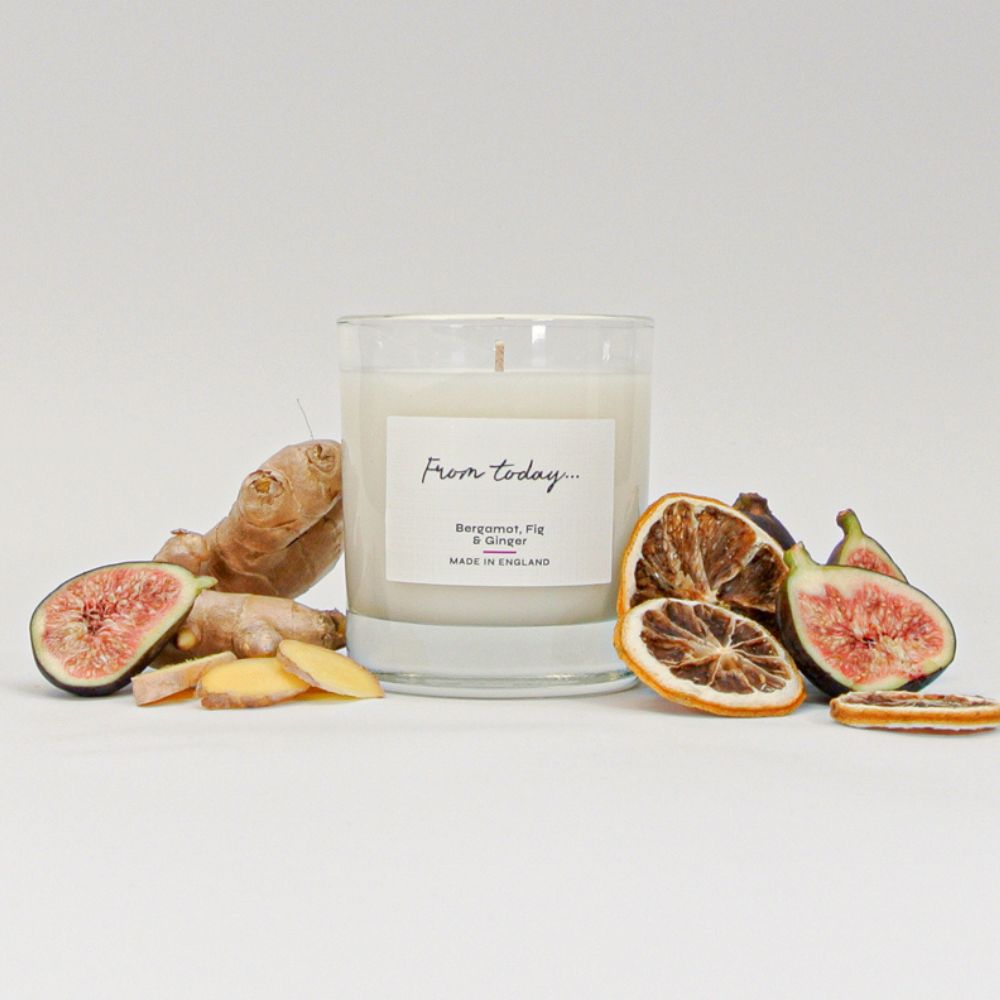 Luxury Bergamot, Fig and Ginger 200g Candle with surrounded by fruit