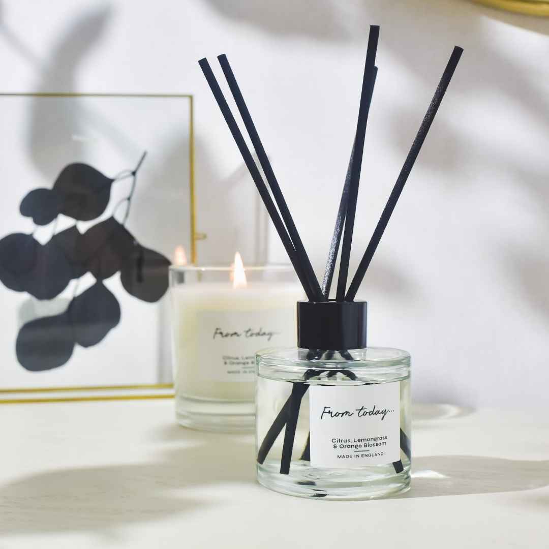 Luxury reed diffuser gift displayed on dressing table with matching candle