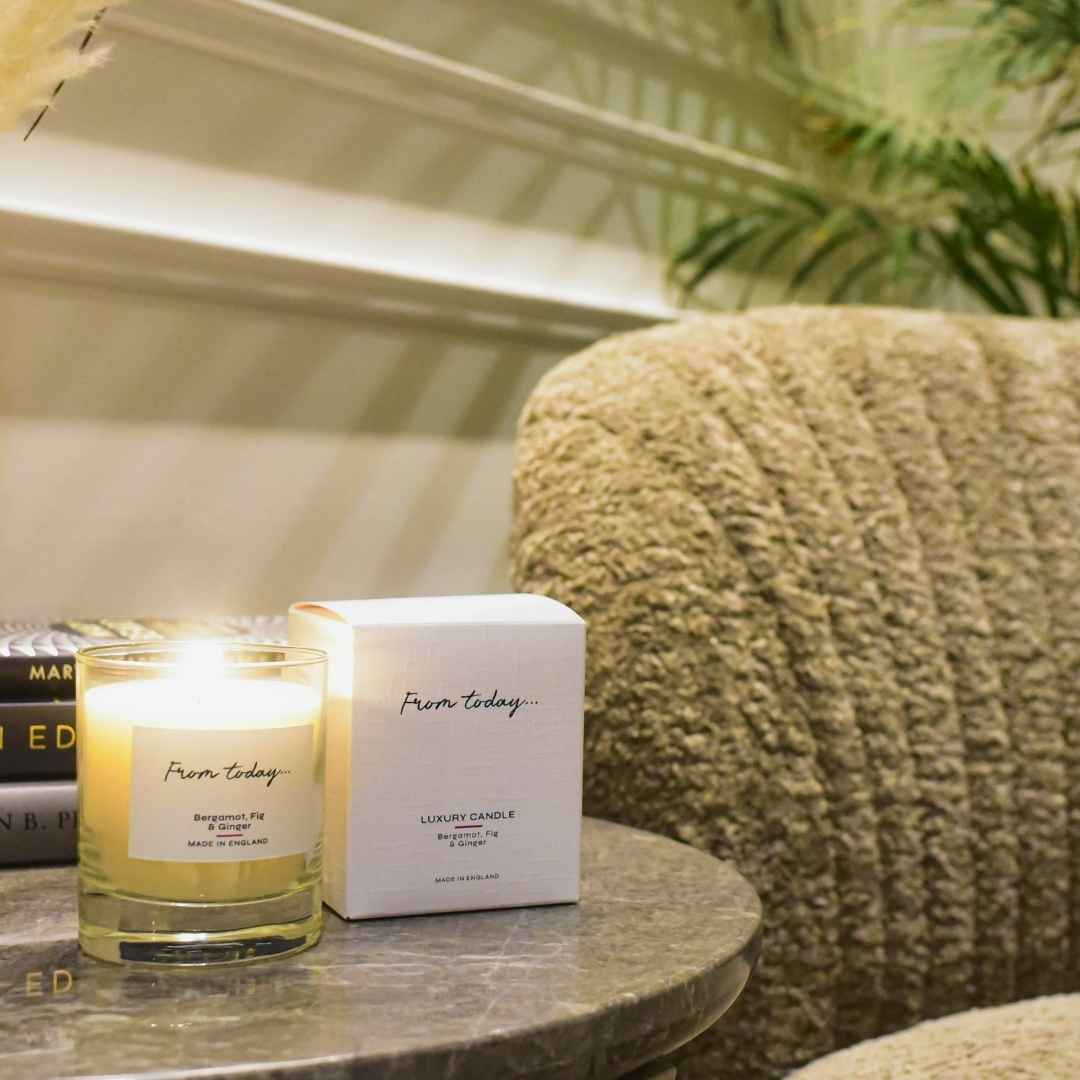 bergamot, fig & ginger luxury candle with display box in a home setting